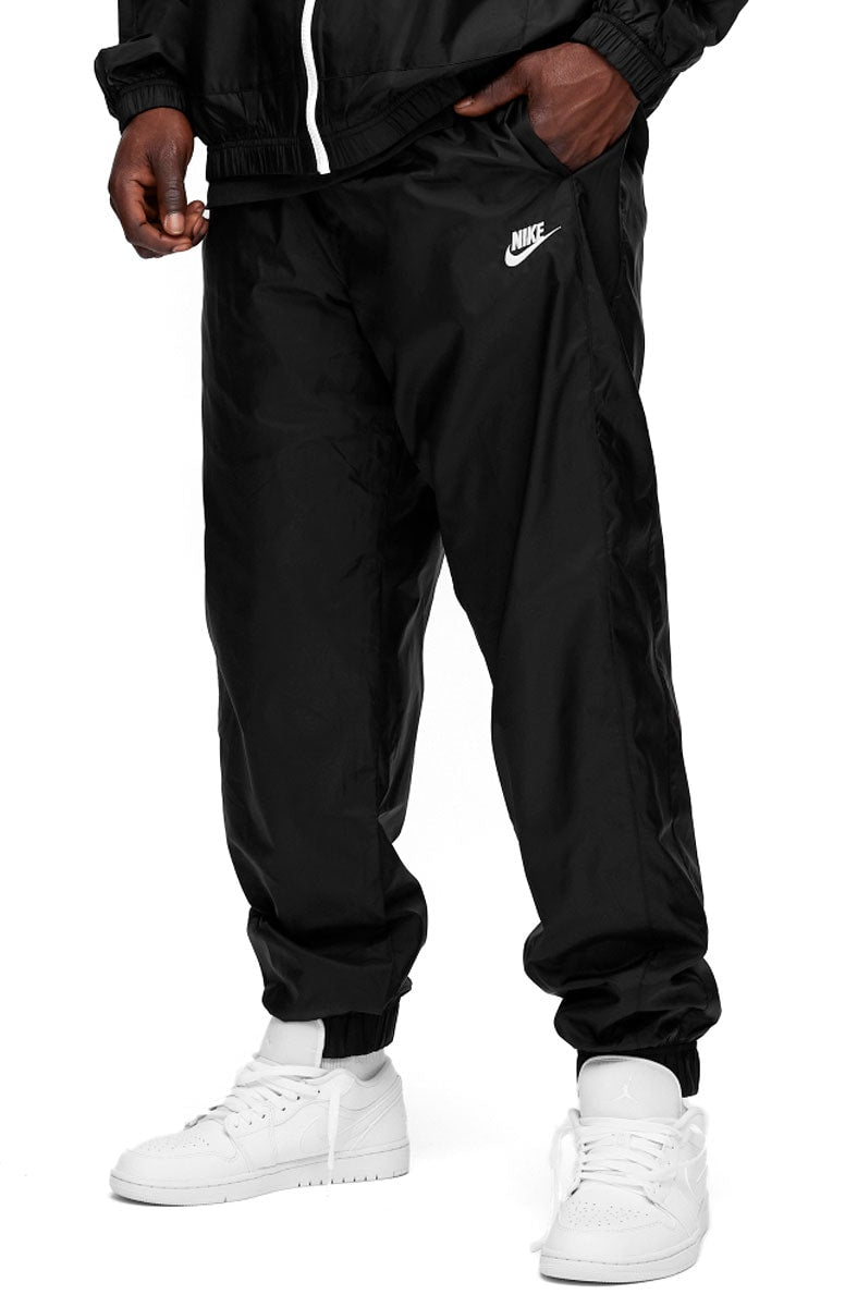 Calça NIKE Sportswear Corta Vento Preto/Preto - NewSkull