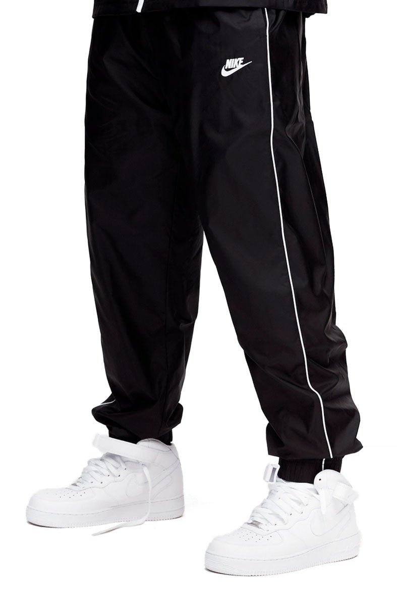 Calça NIKE Sportswear Quebra Vento Preto/Branco - NewSkull