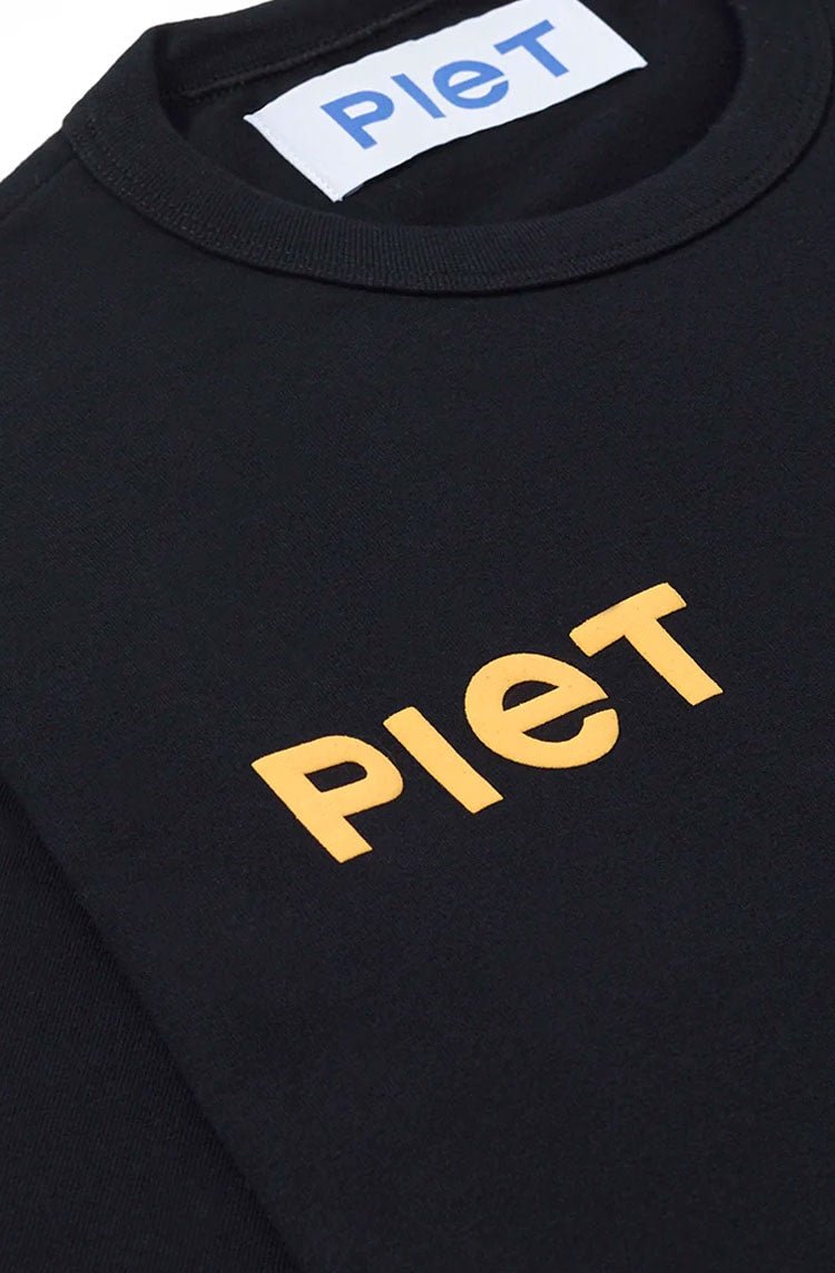 Camiseta Piet 12'22' Tee S - Fit Preto/Amarelo - NewSkull