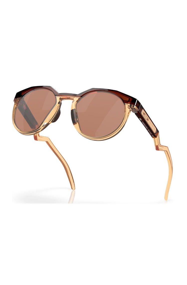 Óculos de Sol Oakley Kylian Mbappé Signature Series HSTN Dourado/Marrom - NewSkull