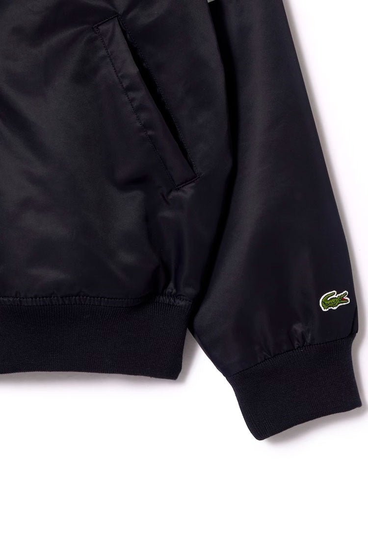 Jaqueta Lacoste Bomber Acolchoada Impermeável com Emblema Azul Marinho - NewSkull
